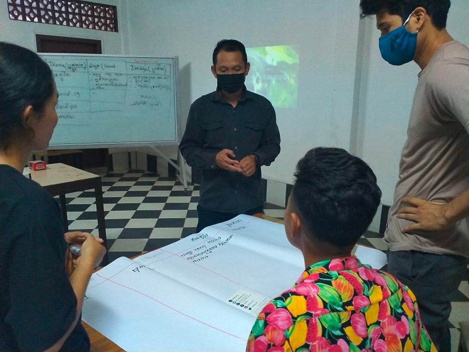 Young Cambodians preparing a storyboard as part of a filmmaking workshop at Spean Chivit